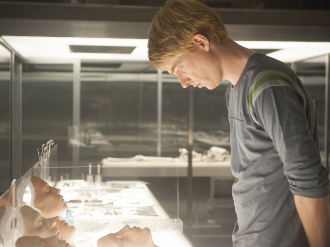 Caleb (Domhnall Gleeson) examines Nathan's A.I. wares in "Ex Machina."
