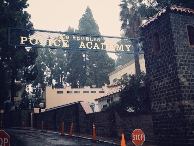 The gates of the Los Angeles Police Academy on a rainy day.