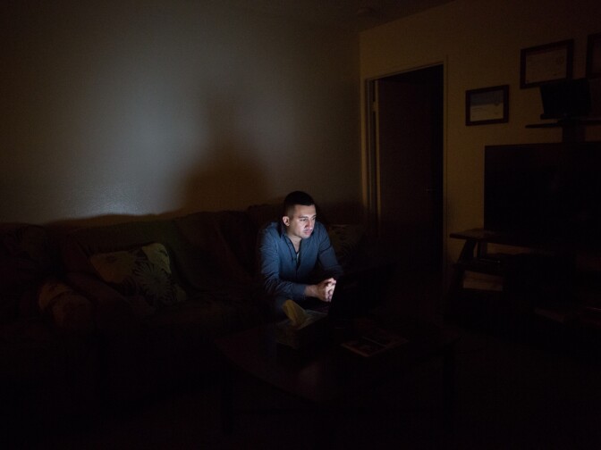Tariq Abu Khumra talks with his family in Iraq over Skype at least three times a week.