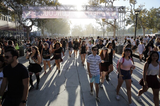 Concertgoers walk through the gates of FYF Fest 2014.