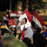 Egyptian opposition protesters celebrate on July 1, 2013 in Cairo's landmark Tahrir square after Egypt's armed forces gave President Mohamed Morsi 48 hours to meet the demands of the people or it would intervene with a roadmap. The statement comes a day after millions took to the street demanding that Morsi resigns. An official from Morsi's Muslim Brotherhood said the powerful movement was 'studying' the army's statement. Egypt is deeply divided between Morsi's Islamist supporters and a broad-based opposition.