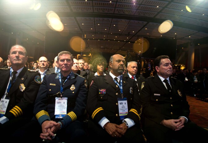 Law enforcement officers listen to US President Barack Obama speak at the International Association of Chiefs of Police Annual Conference and Exposition in Chicago on October 27, 2015.   AFP PHOTO/NICHOLAS KAMM        (Photo credit should read NICHOLAS KAMM/AFP/Getty Images)