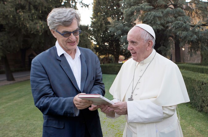 Director Wim Wenders (left) and Pope Francis (right) during the filming of "Pope Francis: A Man of His Word," a Focus Features release.