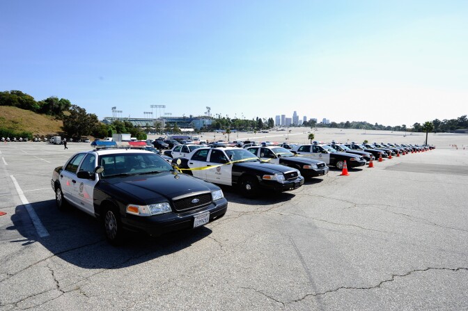 File: Los Angeles Police Department patrol cars are deployed at Dodger Stadium prior to the start of a game between the St. Louis Cardinals and the Los Angeles Dodgers on April 14, 2011 in L.A.