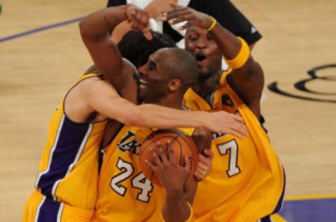 Kobe Bryant #24, Lamar Odom #7 and Sasha Vujacic #18 of the Los Angeles Lakers celebrate after winning the 2010 NBA Championship 83-79 against the Boston Celtics in Game Seven of the 2010 NBA Finals at Staples Center on June 17, 2010 in Los Angeles, California.