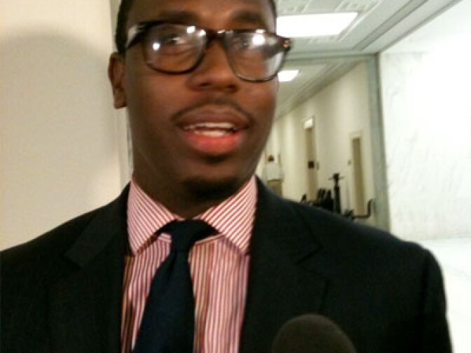 Maxine Waters' chief of staff, and her grandson, Mikael Moore.