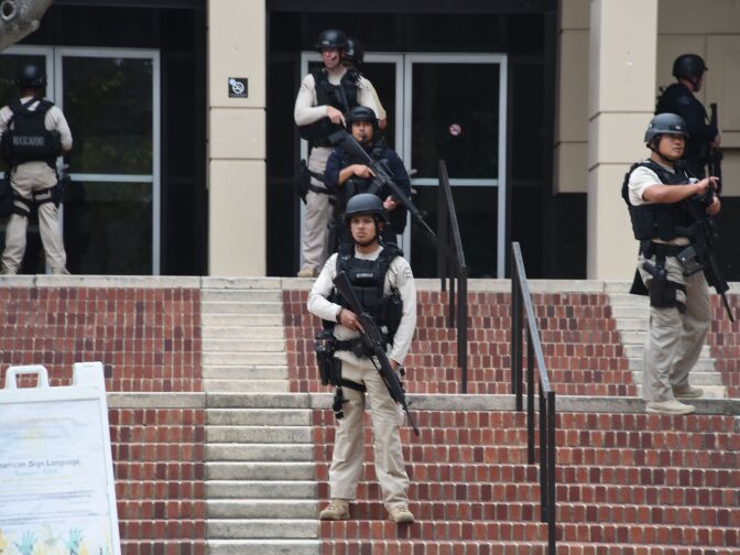 Members of security are seen on June 1, 2016 at the University of California's Los Angeles campus on June 1, 2016 in Los Angeles, California.
Two people were confirmed dead on Wednesday following a shooting at the University of California's Los Angeles campus, police said. "We have confirmation of two people killed for now," police spokeswoman Jenny Houser told AFP, adding that the identity of the victims was unclear.
 / AFP / Robyn BECK        (Photo credit should read ROBYN BECK/AFP/Getty Images)