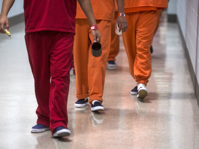 Detainees are taken back to their dorms after lunch at the U.S. Immigration and Customs Enforcement's Detention Facility in Adelanto on Friday, Sept. 2, 2016.