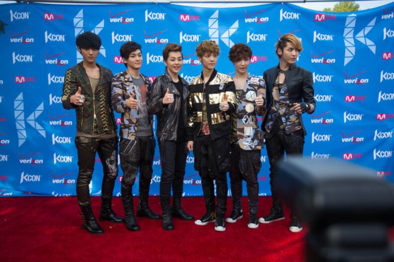 Members of the K-Pop supergroup Exo pose for photographs at KCON on Sunday. The group is split into two parts, one focused on the Korean market and one focused on the Chinese market.