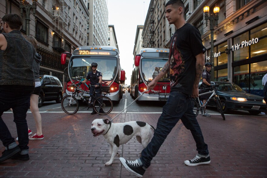 Police block off the streets of downtown Los Angeles to allow peaceful protesters to march in the streets.