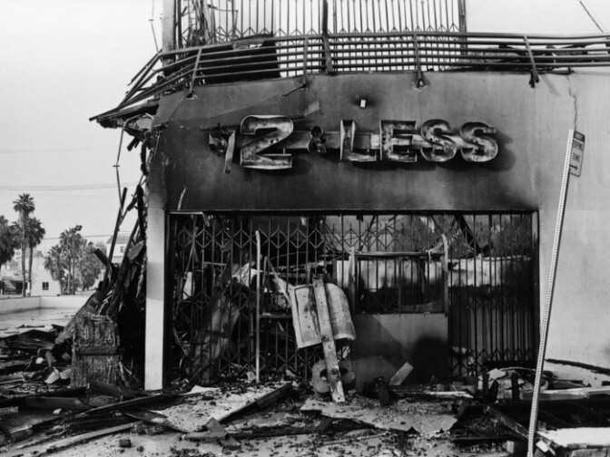 A $2 or Less store destroyed by fire during the LA Riots on April 30, 1992.