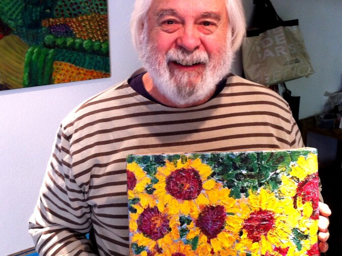 Frank Romero with one of his French paintings, in his home in the South of France.