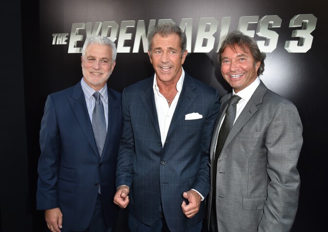 Co-Chairman of Lionsgate Motion Picture Group Rob Friedman, actor Mel Gibson and Co-Chairman of Lionsgate Motion Picture Group Patrick Wachsberger attend the premiere of Lionsgate Films' "The Expendables 3" at TCL Chinese Theatre on August 11, 2014 in Hollywood, California.