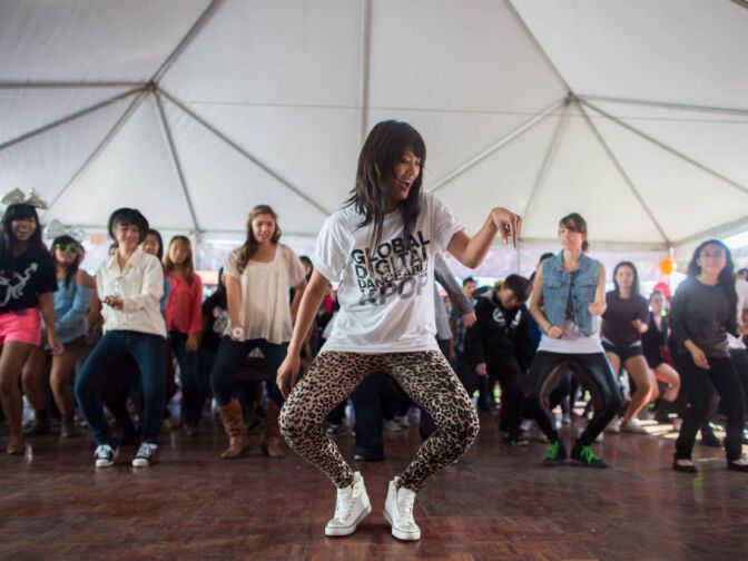 A dance instructor leads a group in one of dozens of choreographed dances tied to individual Korean pop songs at the first-ever KCON convention in Irvine, Calif.