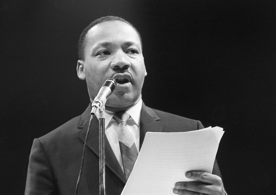 The US clergyman and civil rights leader Martin Luther King addresses, 29 March 1966 in Paris' Sport Palace the militants of the "Movement for the Peace". "Martin Luther King was assassinated on 04 April 1968 in Memphis, Tennessee. James Earl Ray confessed to shooting King and was sentenced to 99 years in prison. King's killing sent shock waves through American society at the time, and is still regarded as a landmark event in recent US history.        (Photo credit should read /AFP/Getty Images)