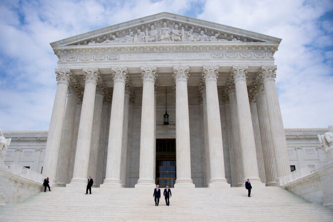Chief Justice John Roberts (2nd R) and Justice Neil Gorsuch (C) walk down the steps of the US Supreme Court in Washington, DC, June 15, 2017. / AFP PHOTO / JIM WATSON        (Photo credit should read JIM WATSON/AFP/Getty Images)