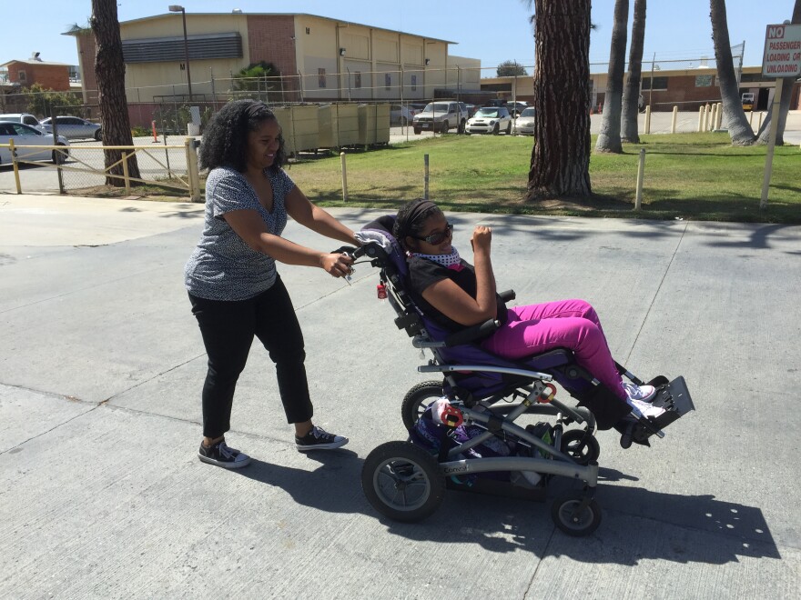 Sherri Brady picks up Lauren Messer from school.