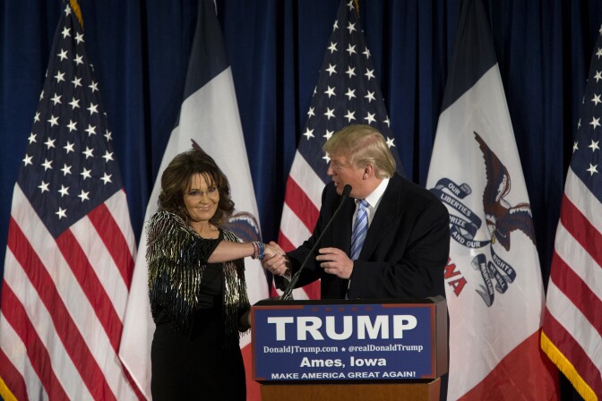 AMES, IA - JANUARY 19:   Republican presidential candidate Donald Trump shakes hands with former Alaska Gov. Sarah Palin at Hansen Agriculture Student Learning Center at Iowa State University on January 19, 2016 in Ames, IA. Trump received Palin's endorsement at the event.  (Photo by Aaron P. Bernstein/Getty Images)