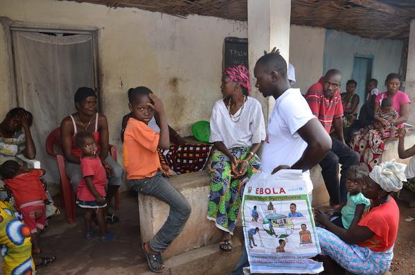 Door-to-door public education on Ebola in Sierra Leone. 