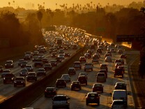 Heavy traffic clogs the 101 Freeway as people leave work for the Labor Day holiday in Los Angeles on Aug. 29, 2014. 