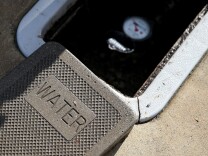 A cover sits next to a water meter on April 7, 2015 in Walnut Creek, California.  