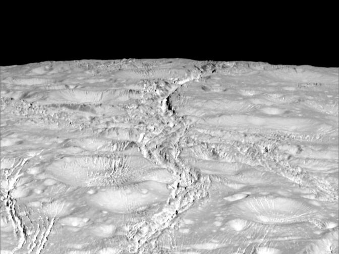 Unlike the South pole of Enceladus, the North pole is marked with impacts from meteoroids.