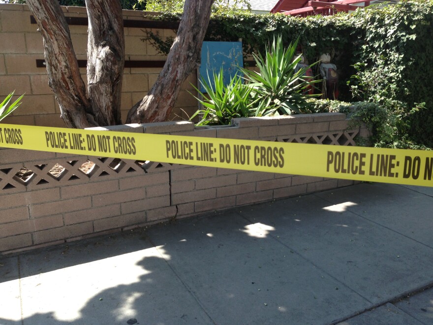 Police tape blocking the Culver City Police Department's parking lot following an officer-involved shooting Saturday morning, Sept. 21, 2013.