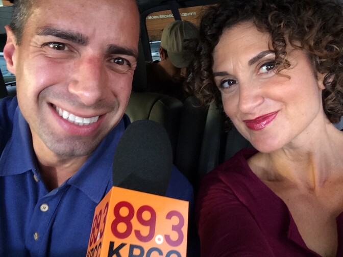 Take Two hosts A Martinez and Alex Cohen pose for a selfie. 