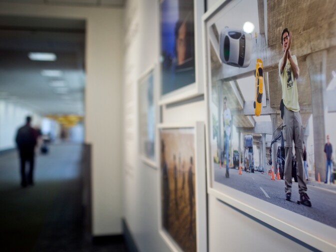 The "Welcome to L.A. / Please Come Again" exhibit opened four weeks ago between terminals 7 and 8 at Los Angeles International Airport. It features features 37 different artworks.