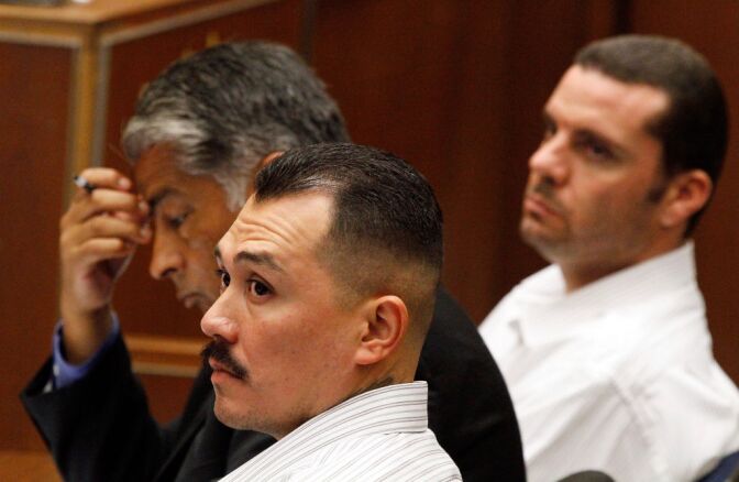 LOS ANGELES, CA, JUNE 08:  (R-L) Marvin Norwood, his attorney Victor Escobedo and co-defendant Louie Sanchez listen during preliminary proceedings in Superior Court June 8, 2012. 