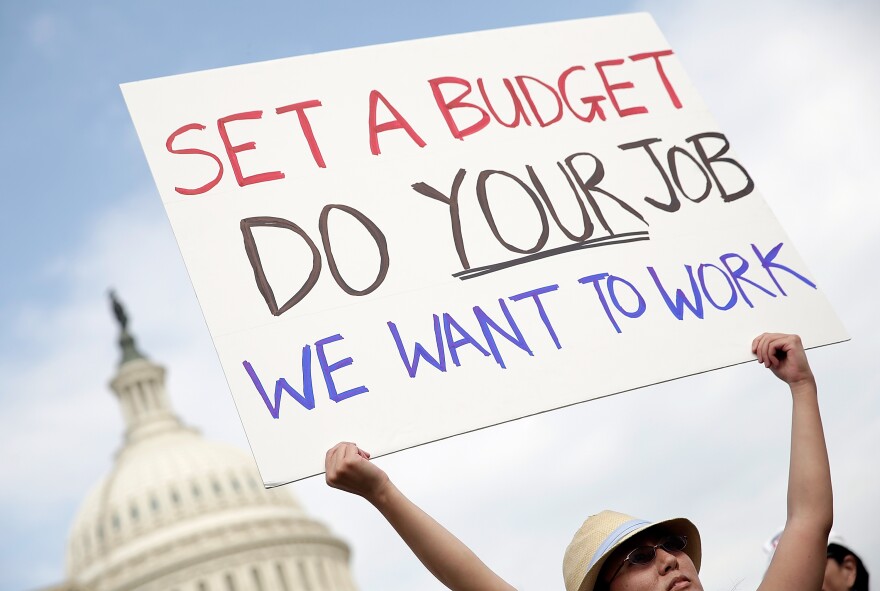 Furloughed federal workers protest outside the U.S. Capitol to demand an end to the lockout of federal workers caused by the government shutdown October 4, 2013 in Washington, DC. Today marks the fourth day of the government shutdown as Republicans and Democrats remain at an impasse over funding the federal government. 
