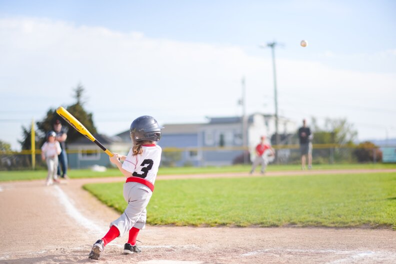 Coach Sean Eley assembled the Rockford Peaches with his daughter and her friends. They are the first ever West Seattle Little League team in the coach-pitch division composed entirely of girls.