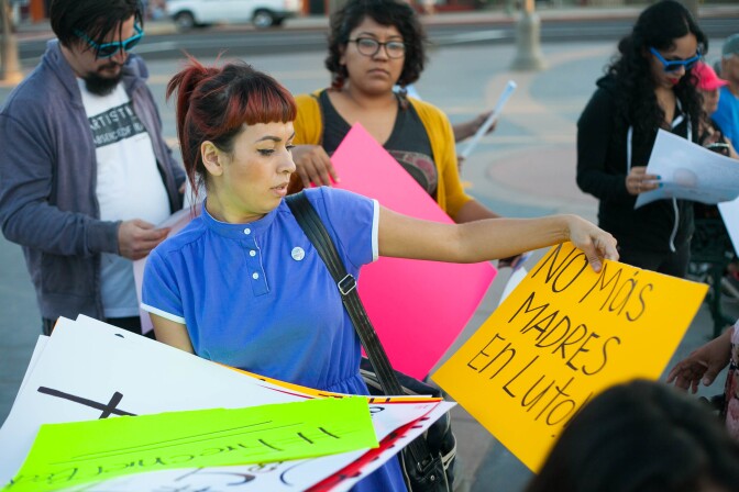 Maryann Aguirre helped to organize a vigil and protest against police violence for Jesse Romero in Boyle Heights, Calif. on Wednesday, Aug. 10, 2016.