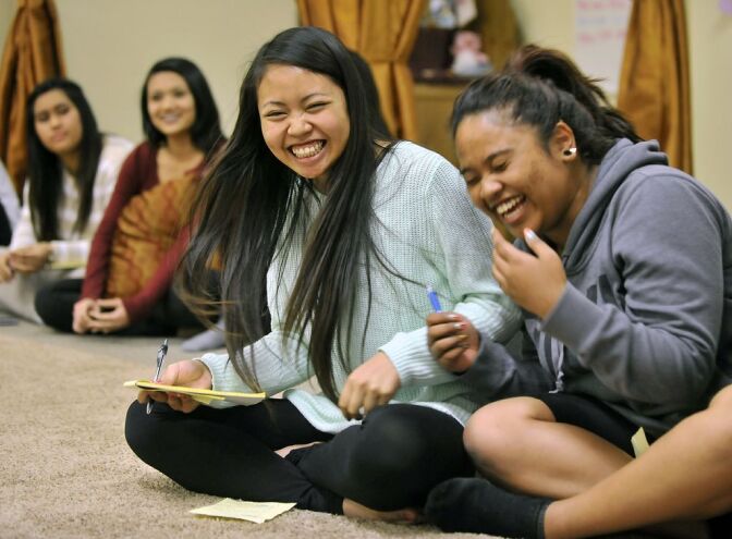 Girls laugh during a group debate exercise at the Khmer Girls in Action offices in Long Beach. Cambodia Town, officially recognized by the Long Beach City Council in 2007, is a hub for about 44,000 Cambodians living in Los Angeles and Orange counties. 