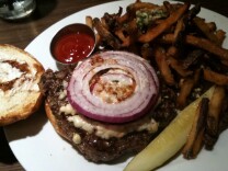 A Hamburger Hamlet burger with blue cheese, horseradish, A1 sauce, red onions and garlic fries.