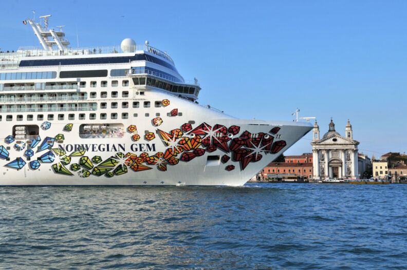 The Norwegian Gem cruise liner ship passes in front of St Mark's square in Venice's basin on February 10, 2010.    