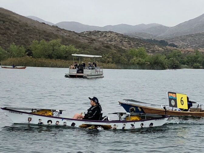 High school students race boats they built themselves across Lake Skinner near Temecula in the 2018 Solar Cup.