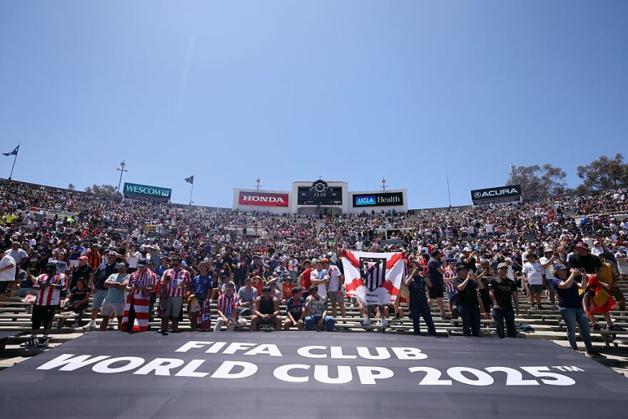 Fans rally excited in a crowd at Rose Bowl Stadium for FIFA Club World Cup 2025.