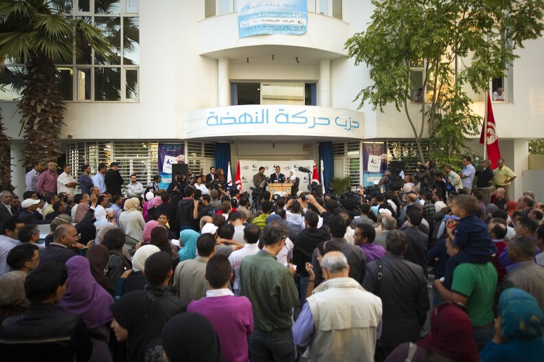 Members of Islamist Ennahda party address media and supporters on October 24, 2011 in Tunis. The Islamist Ennahda party which claimed to have captured about 40 percent of the vote in the country's first free polls, as the cradle of the Arab Spring basked in praise for its democratic revolution. AFP PHOTO/ LIONEL BONAVENTURE (Photo credit should read LIONEL BONAVENTURE/AFP/Getty Images)