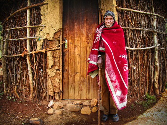 A 105 year-old man introduced Allan Karl to many generations of his family and showed him his thatched hut, which he explained needed rebuilding every three years: stick, mud and dung.