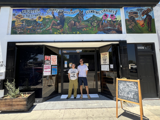 Coyotl+Macehualli  co-founders Brenda Contreras and Micah Haserjian stand outside the Tool and Book Lending Library on 3347 Eastern Avenue in El Sereno.