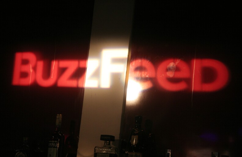 Sponsor logos are seen at BuzzFeed's Throwback Thursday: '90s Nostalgia Night presented by Hasbro Game Night and Canon PowerShot at the Canal Room on Thursday, Nov. 21, 2013 in New York. (Photo by Andy Kropa/Invision for BuzzFeed/AP Images)