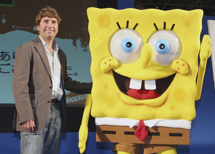 TOKYO, JAPAN - MARCH 23: Stephen Hillenburg, the writer of a U.S. cartoon "The SpongeBob SquarePants" poses with its charactor SpongeBob SquarePants at an event held at Tokyo International Anime Fair on March 23, 2006 in Tokyo, Japan. The film of this popular U.S. Cartoon will open on April 22 in Japan. (Photo by Junko Kimura/Getty Images) 