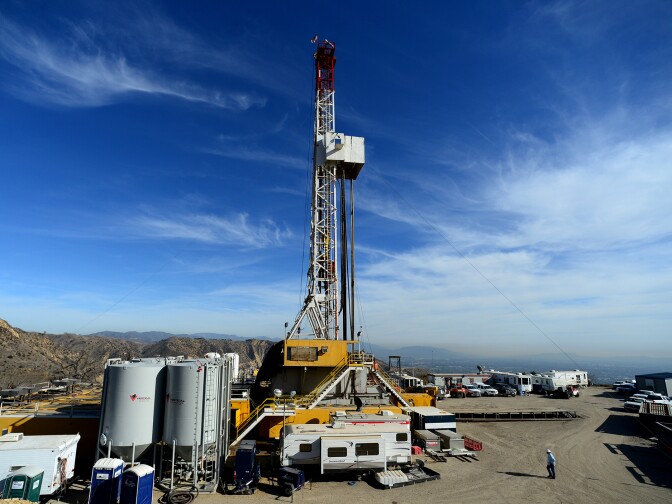 Crews from SoCalGas and outside experts work on a relief well at the Aliso Canyon facility above Porter Ranch on Dec. 9, 2015. Once the relief well is connected to the leaking well, SoCalGas will pump fluids and cement into the bottom of the leaking well to stop the flow of gas and permanently seal the well.