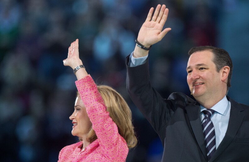 US Senator Ted Cruz(R-TX) and his wife Heidi wave to the crowd after he announced his candidacy for the Republican nomination to run for US president March 23, 2015, inside the Vine Center at Liberty University, in Lynchburg, Virginia.   AFP PHOTO/PAUL J. RICHARDS        (Photo credit should read PAUL J. RICHARDS/AFP/Getty Images)