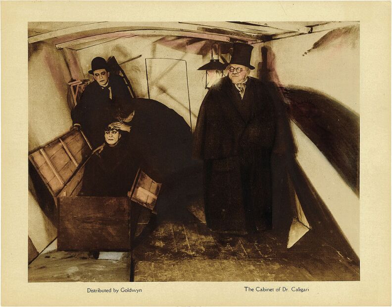 Lobby Card from the 1920 film 'The Cabinet of Dr. Caligari' as doctors examine his somnambulist, Cesare. This is the only card with Caligari and Cesar together.