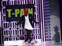 File: T-Pain performs during "The Big Live Comedy Show" presented by YouTube Comedy Week held at Culver Studios on May 19, 2013 in Culver City.