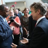DES MOINES, IA - MAY 16:  Dr. Ben Carson (L) and Senator Rand Paul (R-KY) (R) greet guests gathered for the Republican Party of Iowa's Lincoln Dinner at the Iowa Events Center on May 16, 2015 in Des Moines, Iowa. The event sponsored by the Republican Party of Iowa gave several Republican presidential hopefuls an opportunity to strengthen their support among Iowa Republicans ahead of the 2016 Iowa caucus. (Photo by Scott Olson/Getty Images)