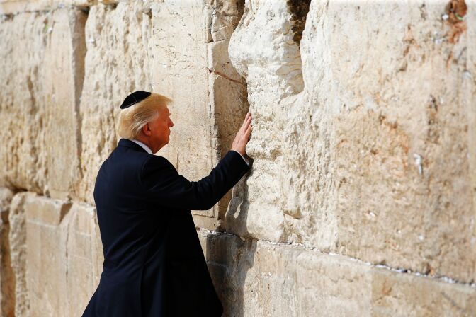 US President Donald Trump visits the Western Wall, the holiest site where Jews can pray, in Jerusalems Old City on May 22, 2017.  / AFP PHOTO / POOL / RONEN ZVULUN        (Photo credit should read RONEN ZVULUN/AFP/Getty Images)