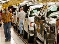 The Labor Department Wednesday reports that U.S. worker productivity grew a modest amount from January through March after having declined in the previous quarter. (Photo: Ford Motor Co. F-150 trucks move along the Kansas City, Mo. assembly line in May 2013.   Photo by Kevin Anderson/Bloomberg via Getty Images).